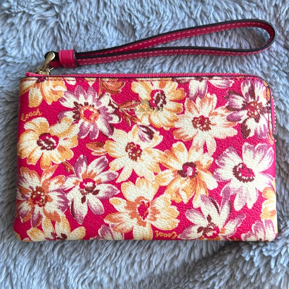 Floral leather coach wristlet